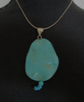 Featuring:  Natural Turquoise, 7.5" plus 3+ inch drop, sterling silver